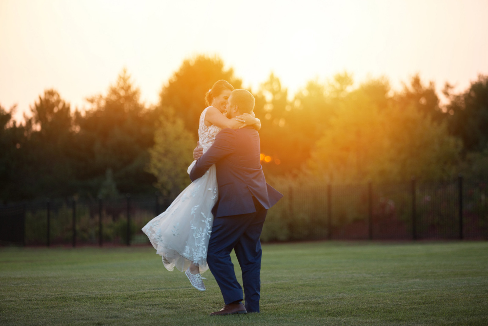 Bride and groom hugging