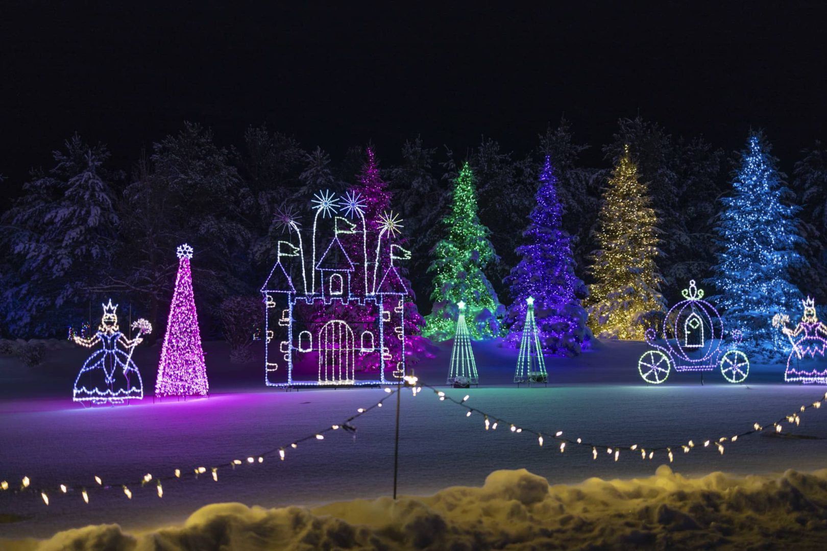 Holiday light display featuring princesses and a castle at Rondele Ranch in Harshaw WI